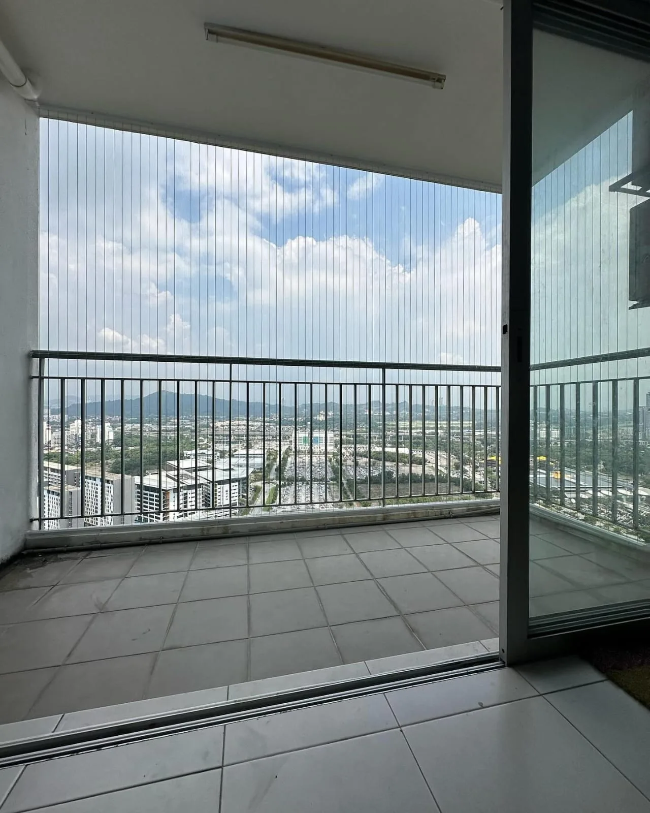 Invisible grill installed in Hyderabad high-rise apartment balcony