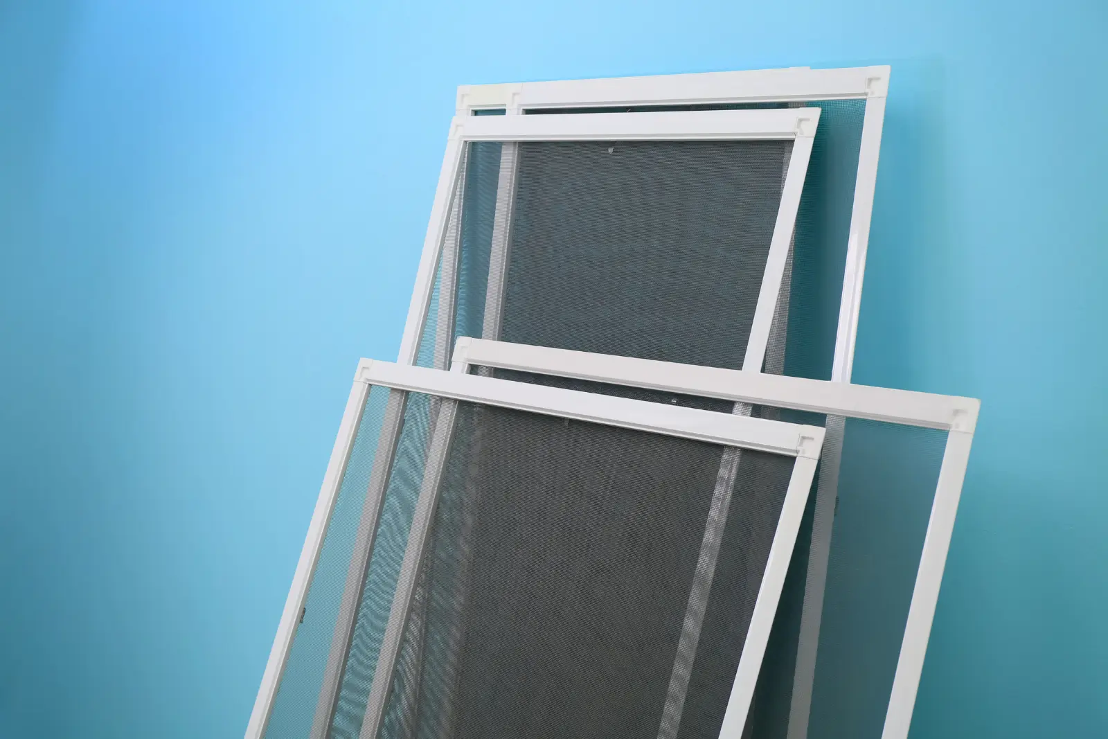Modern window with pleated mosquito net installed